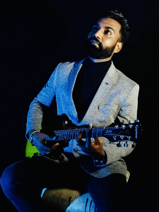 Kuldeep Singh pic with guitar